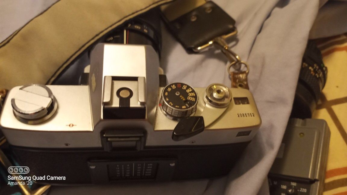 Minolta SRT 202 Vintage Camera with extra accessories