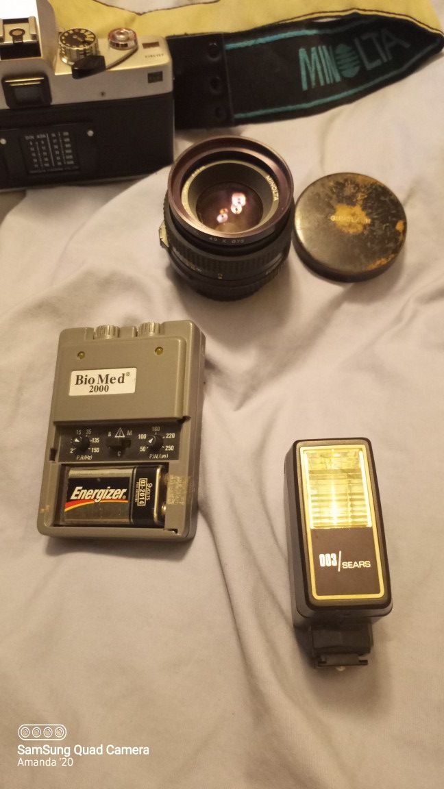 Minolta SRT 202 Vintage Camera with extra accessories