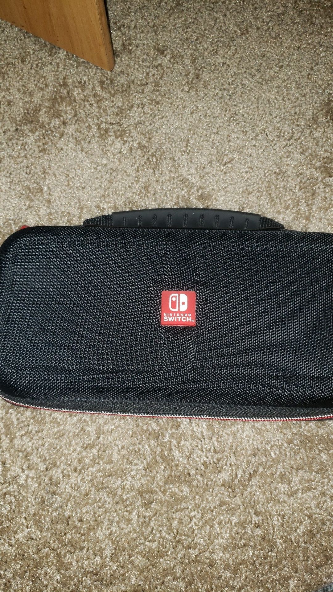 Nintendo switch games and brand new protection pack. Used Nintendo brand carrying case in good condition.