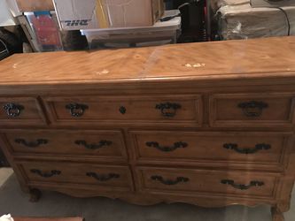 Queen bed with side rails, headboard and foot board. Heavy dresser and night stand. Pineapple knobs . Dresser is lined with crush velvet. Thumbnail