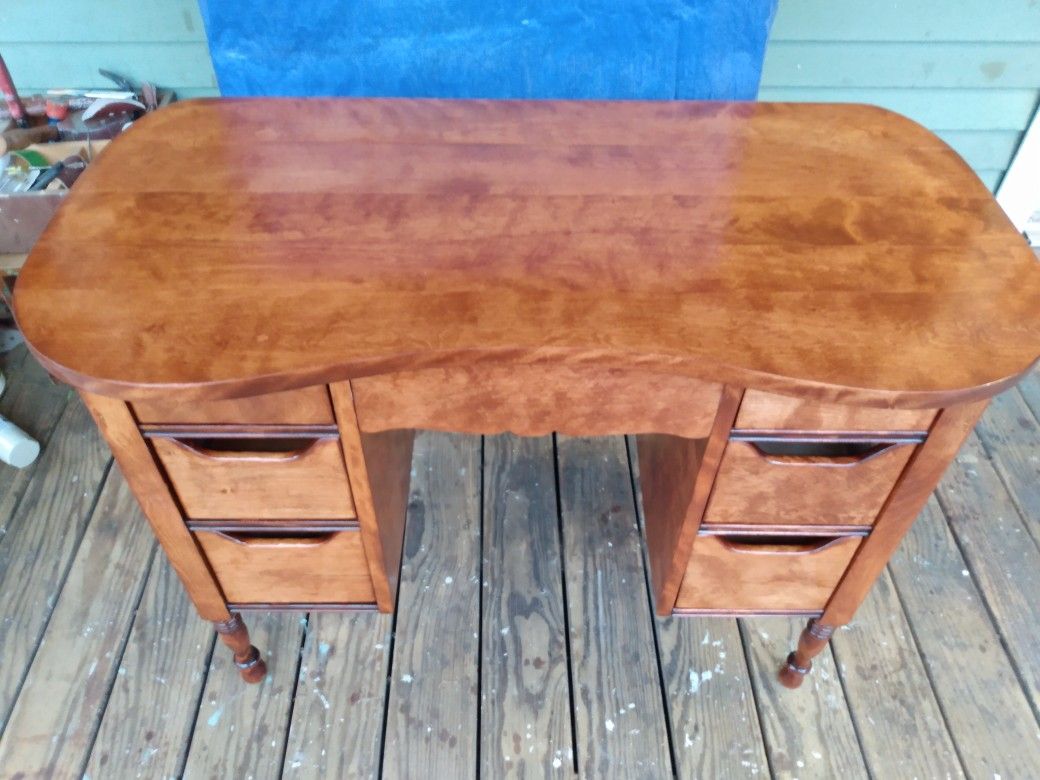 Antique desk solid mahogany with 7 drawers. X Posted