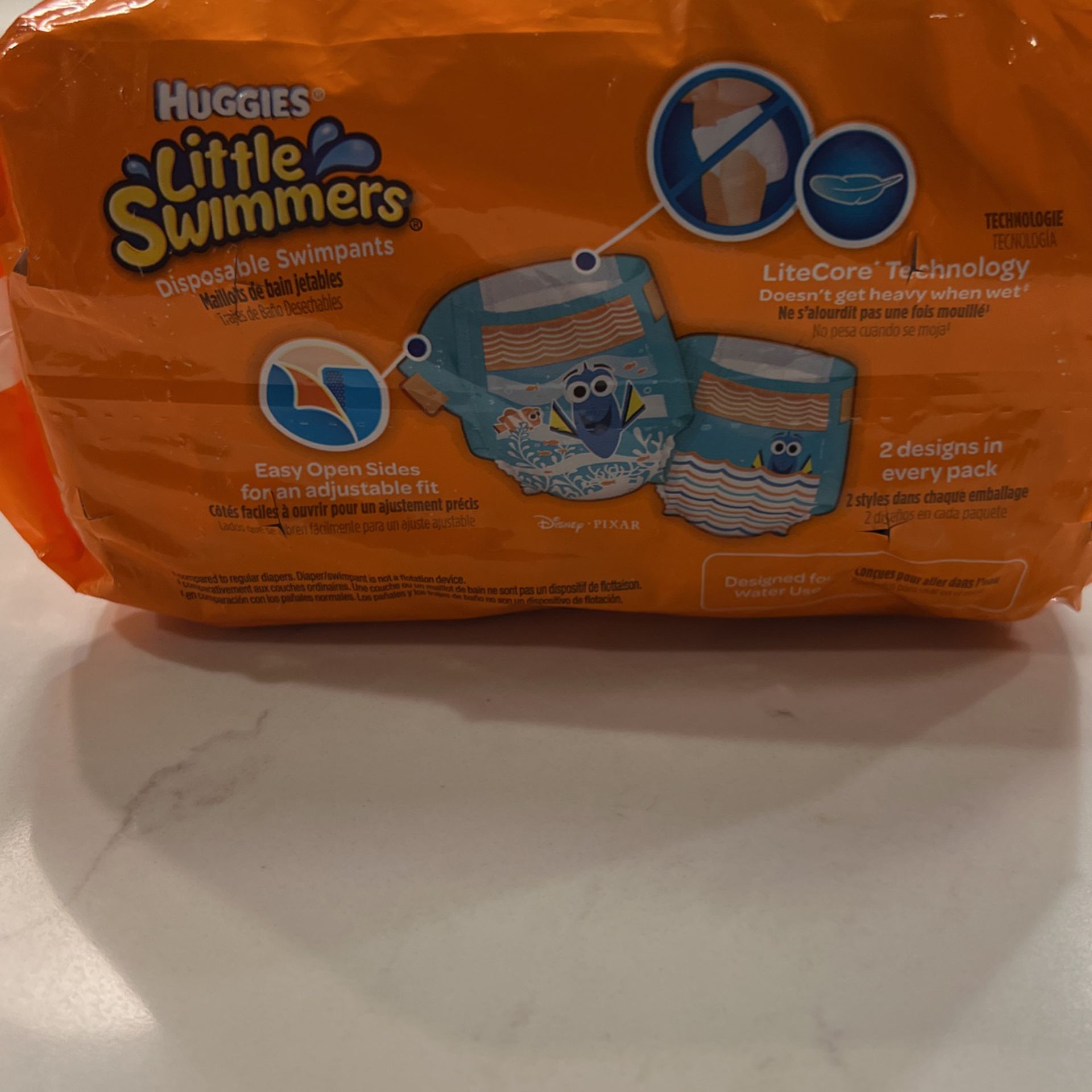 🆕 Huggies Little Swimmers Disposable Swim Diapers, Swimpants, Size 4 Medium (24-34 Pound), 18 Count