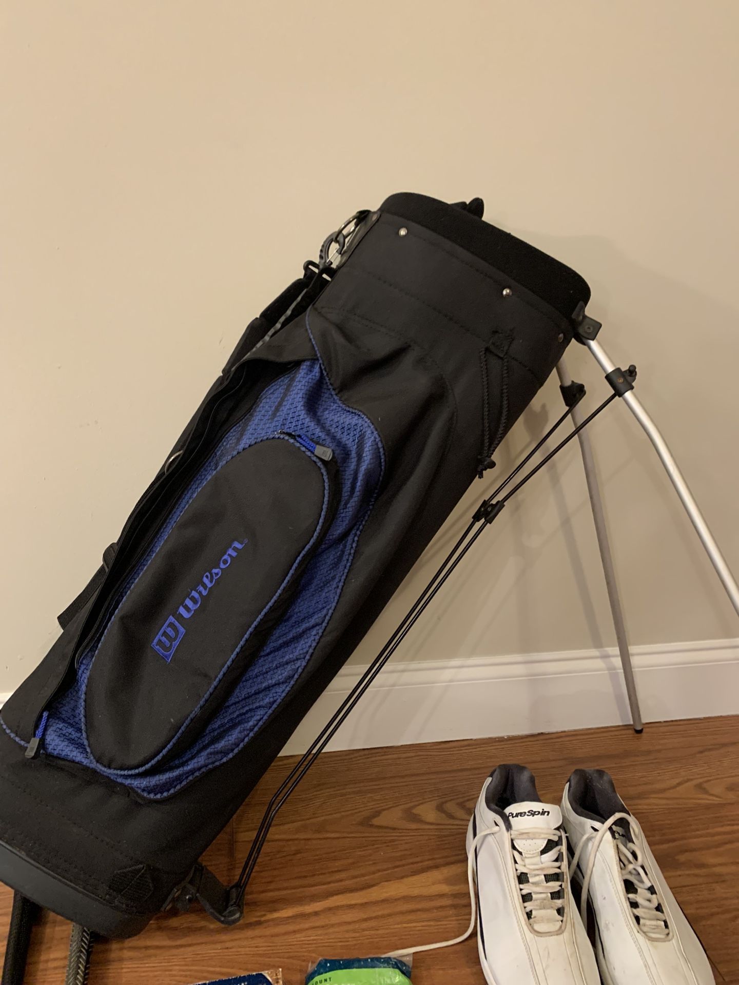 Vintage Wilson 19 golf clubs, bag, shoes, and golf balls.