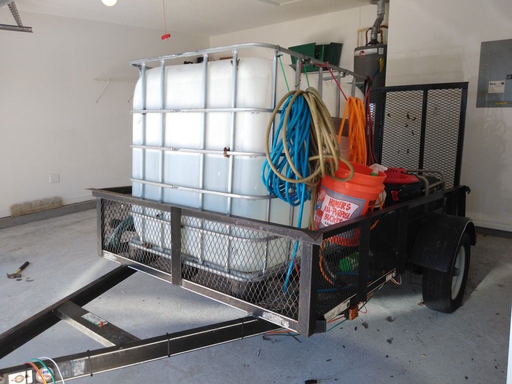 Black trailer with mobile detailing equipment