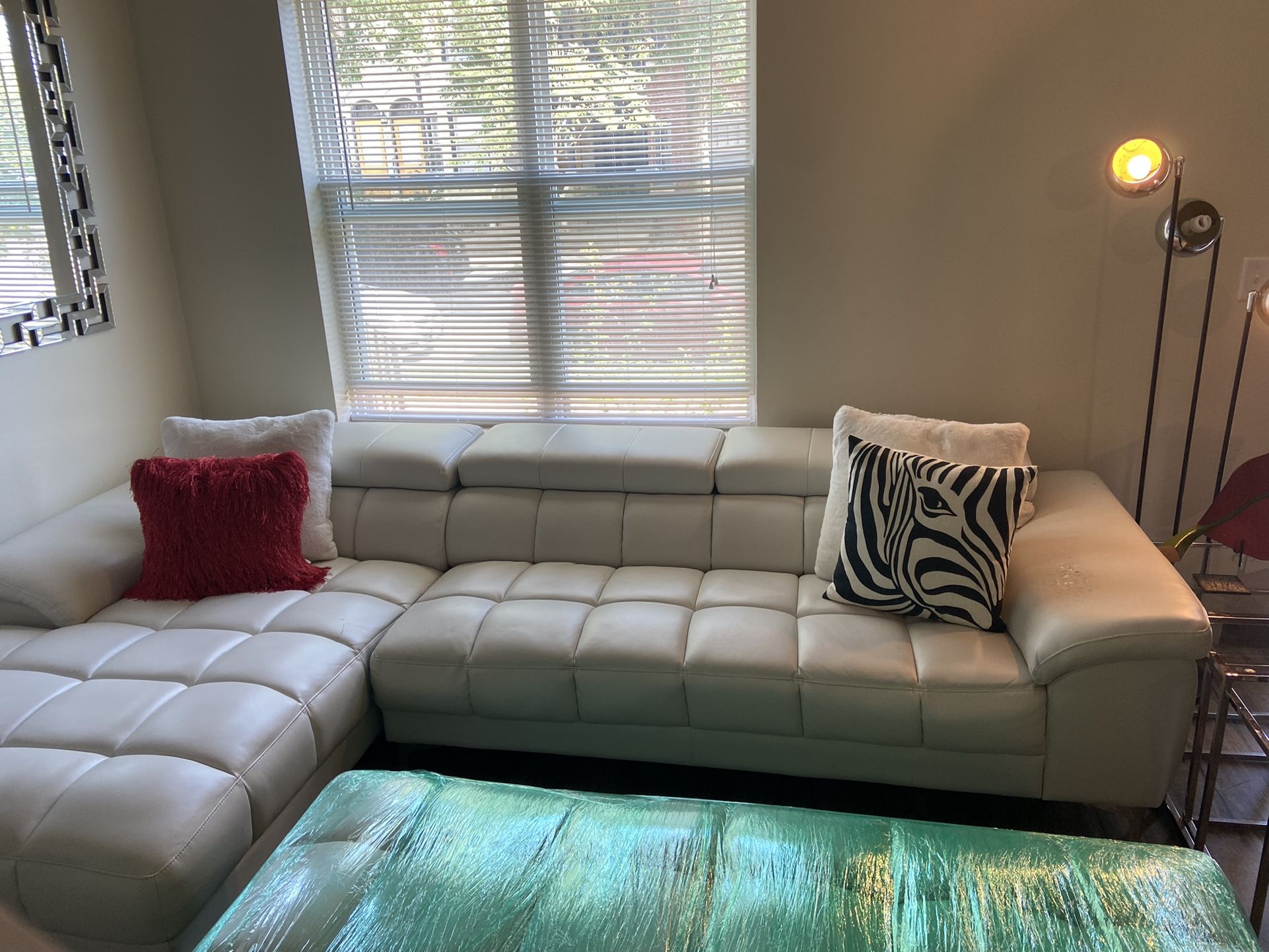 Off White Faux Leather Sectional /ottoman