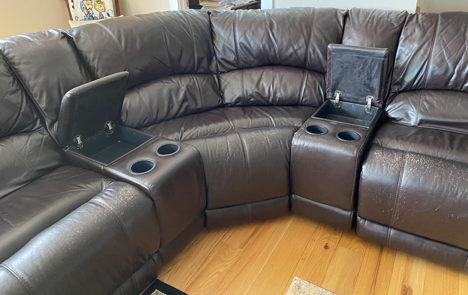 Leather Couch with 3 Built In Manual Recliners, 4 Drink Holders And 2 Storage Areas