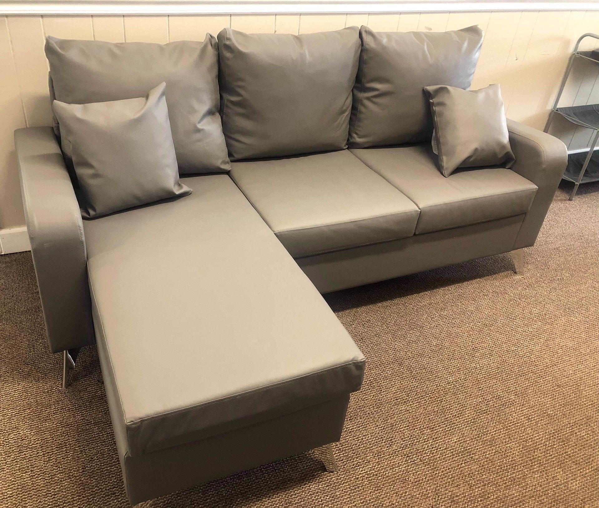 NICE!! SMALL GREY LEATHER SECTIONAL!! (PERFECT FOR KIDS ROOM OR OFFICE!!)