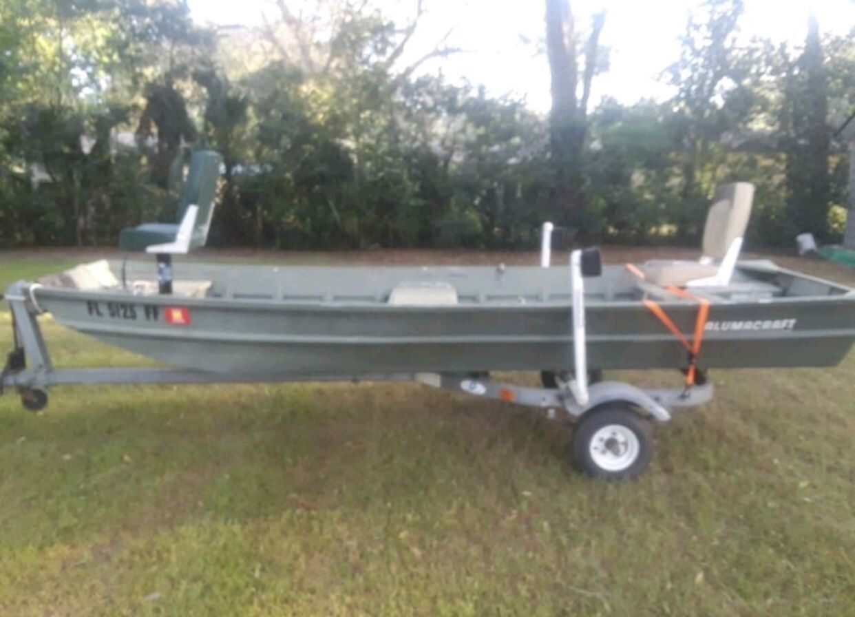 14Ft ALUMACRAFT JON BOAT WITH TRAILER AND TROLLING MOTOR (TITLES IN