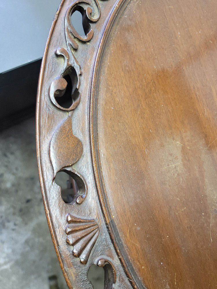 Round ornate Antique Table.
26.75w X 28h