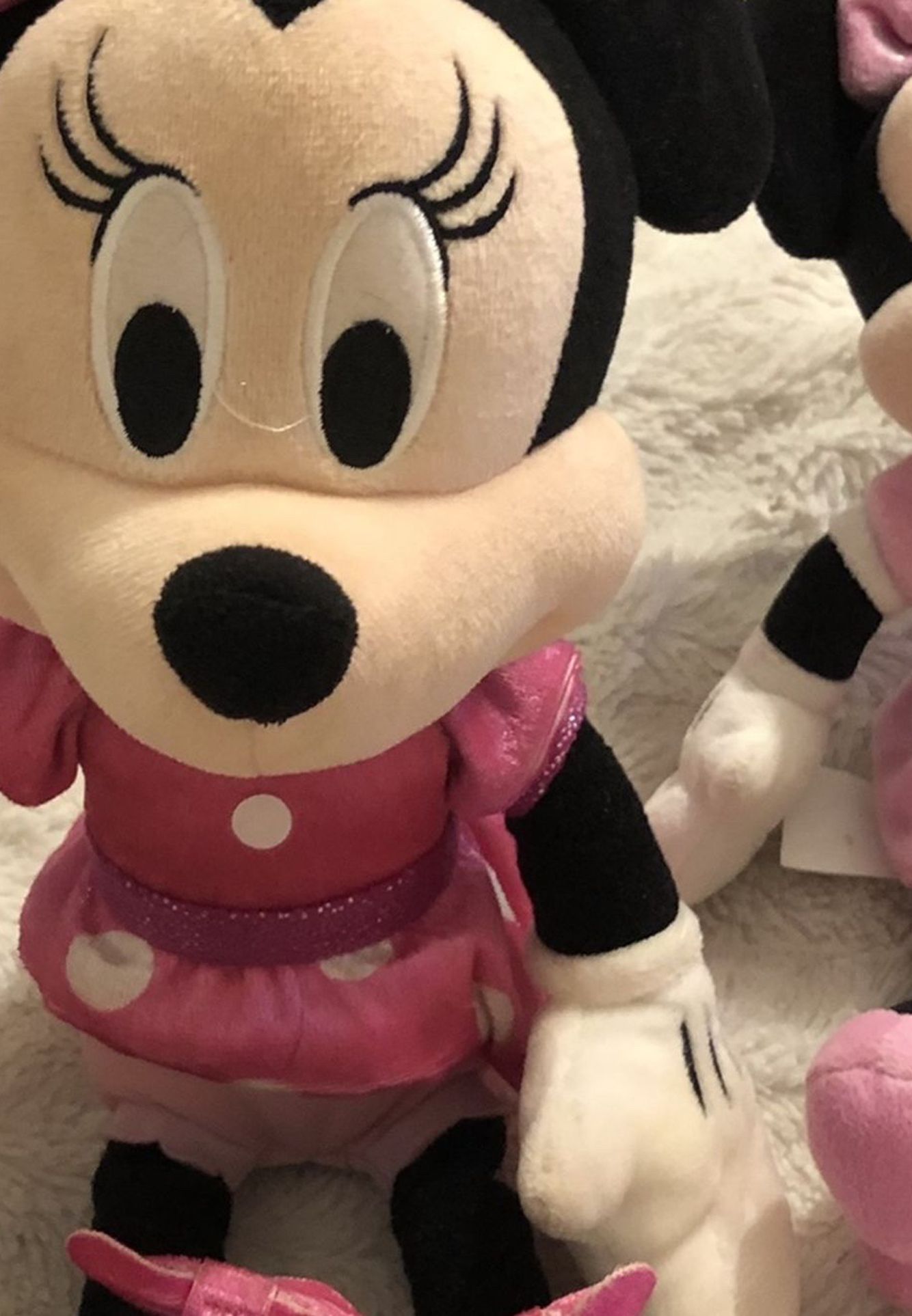 A Little Girl’s Minnie Mouse Bicycle Helmet And 2 Matching Mini Mouse Disney Stuffed Toys