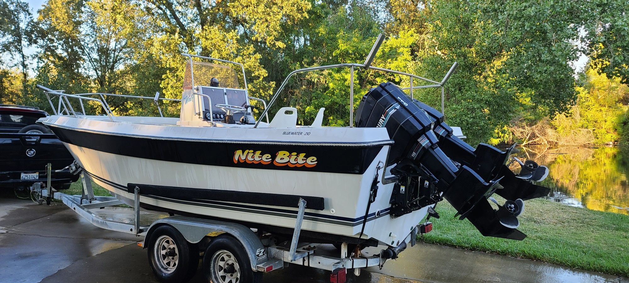 BLUEWATER 210 CENTER CONSOLE BOAT W/ 2 MERCURY 115 OUTBOARDS