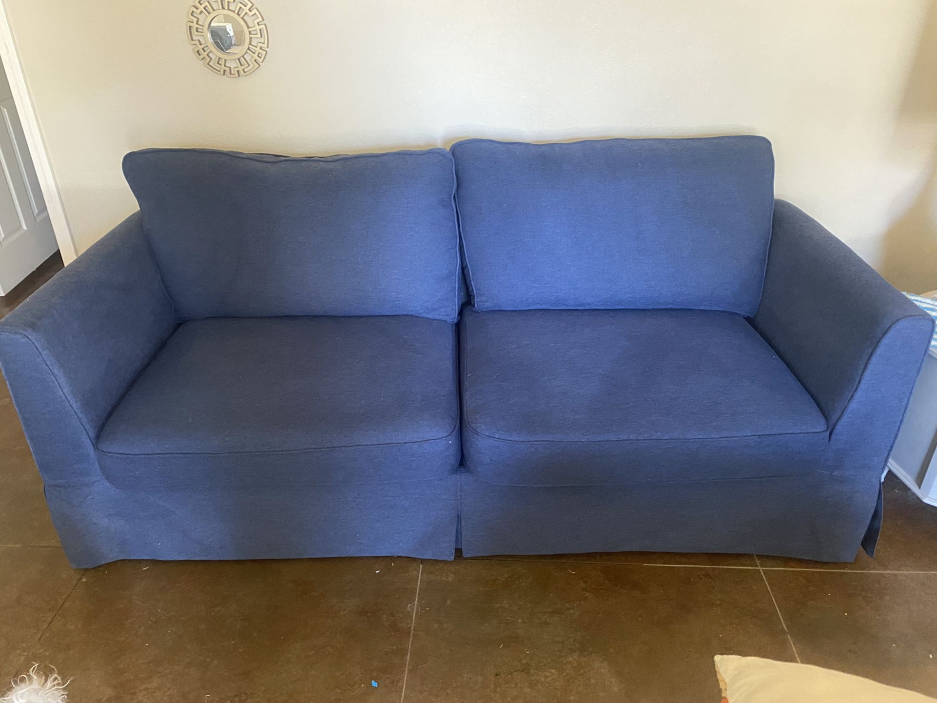 Blue Upholstery Couch And Ottoman