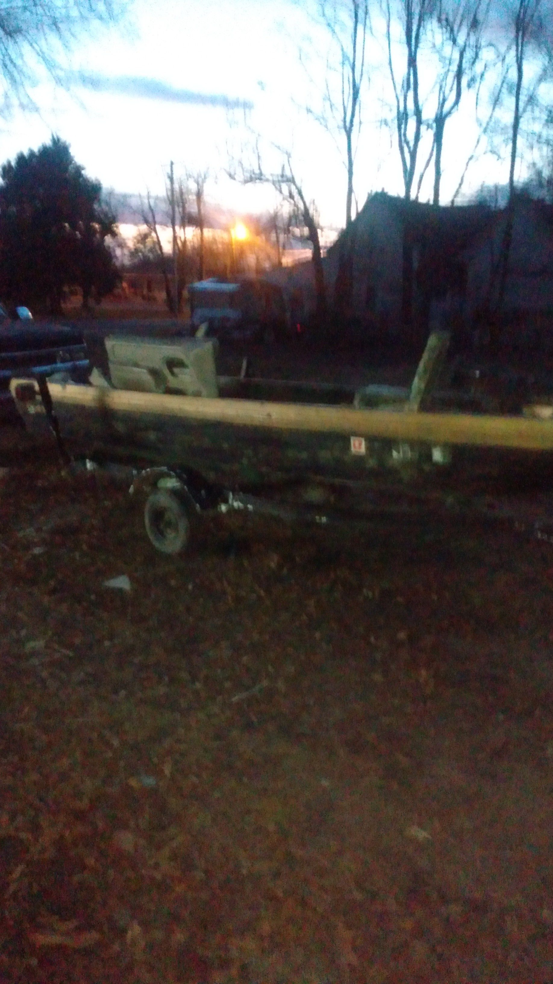 Vintage era fiberglass boat with trailer