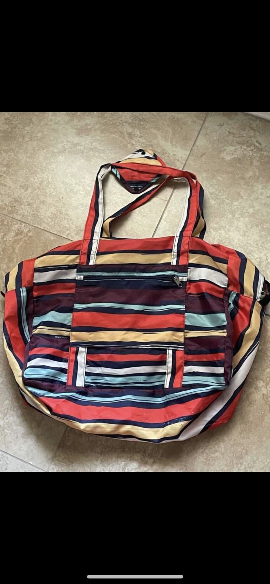 Reisenthel Sunner rainbow colorful lightweight bag that folds up
