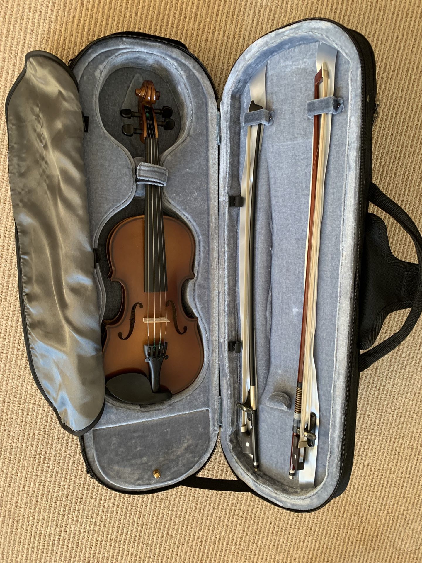 Three different size of Violins (1/4, 3/4, and 4/4) including Bows and Cases