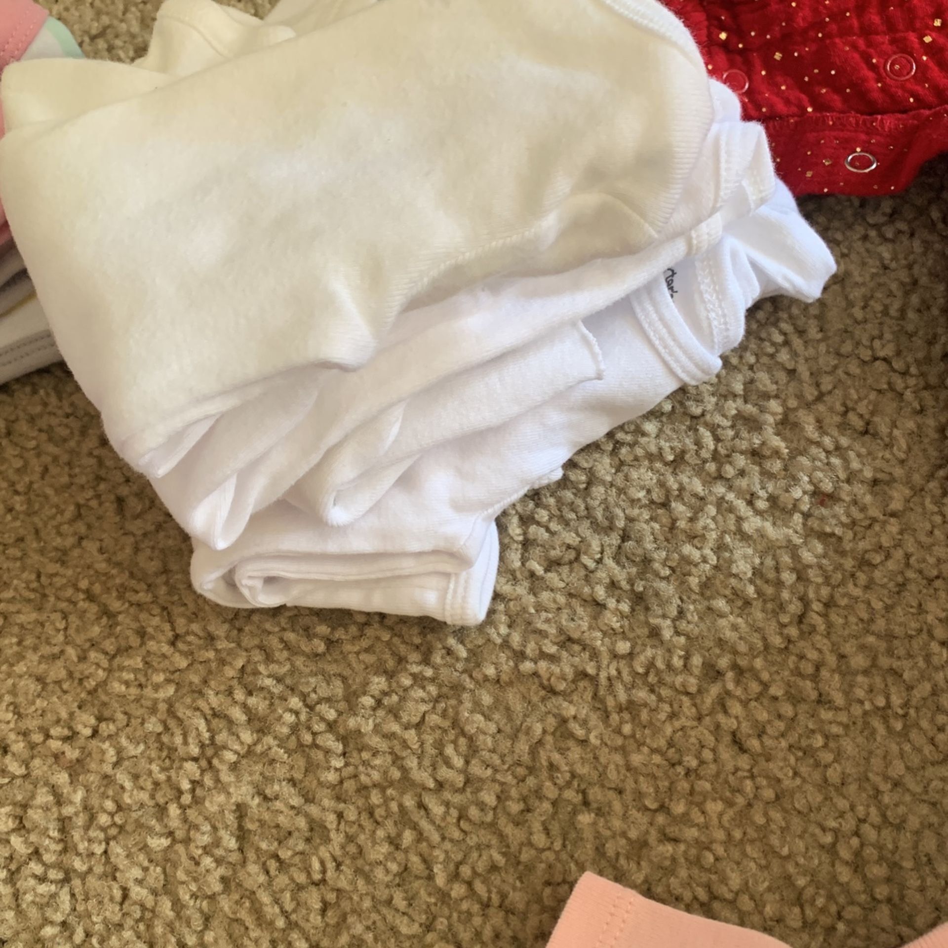 About 20 Newborn To 3 Month Onesies