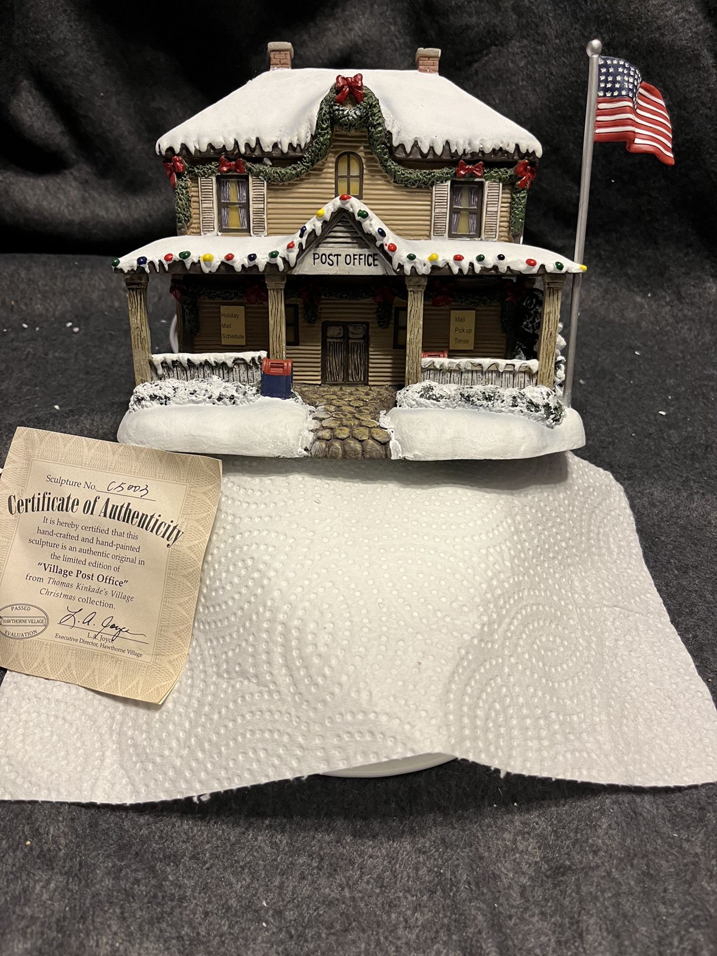 7 “Thomas Kinkade ‘s “ Village Christmas Collection , Each Come with cord that allows them to light up with switch