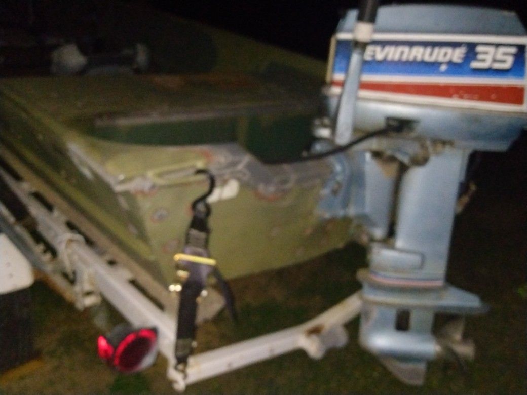PolarCraft 15' 48" bottom with 35 horse Evinrude and trailer