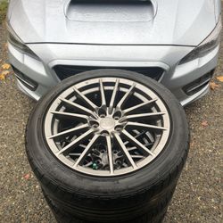 5x100 235 45 17 Subaru Factory Rims And Tires As Is On Picture Dunlop SP SPORT 01 Priced To Sell Thumbnail