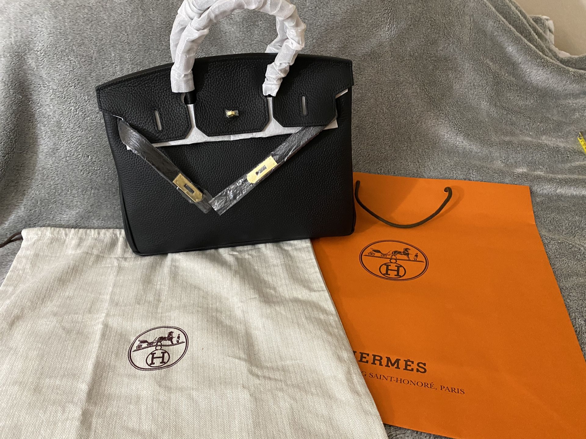 Genuine leather bag with dust and paper bag