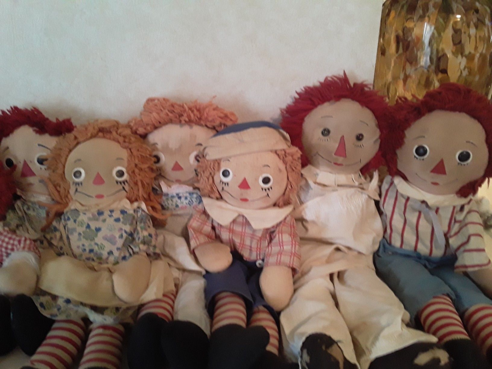 12 vintage Raggedy Ann and Andy Dolls