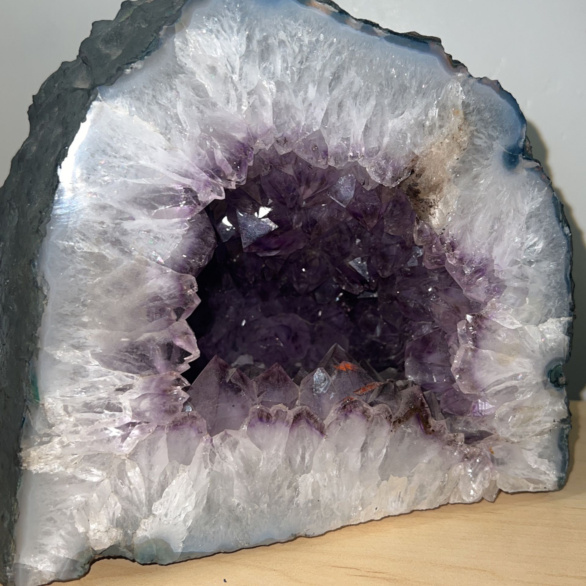 Set of two purple amethyst crystal geodes