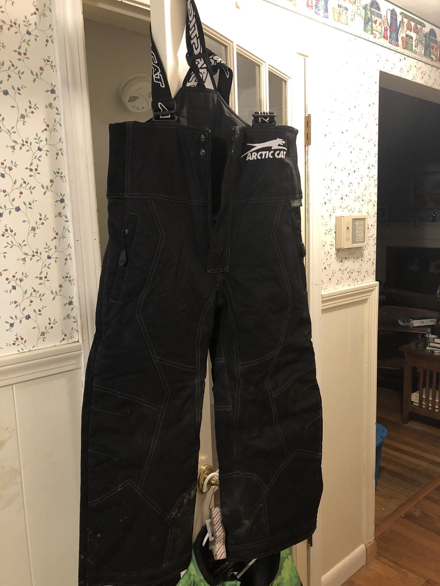 Size medium Snowmobile Helmet and kids size 10 Pants .