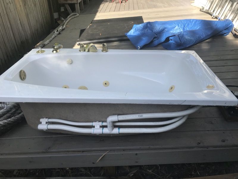Jacuzzi tub for sale comes already plumbed with electric and motor