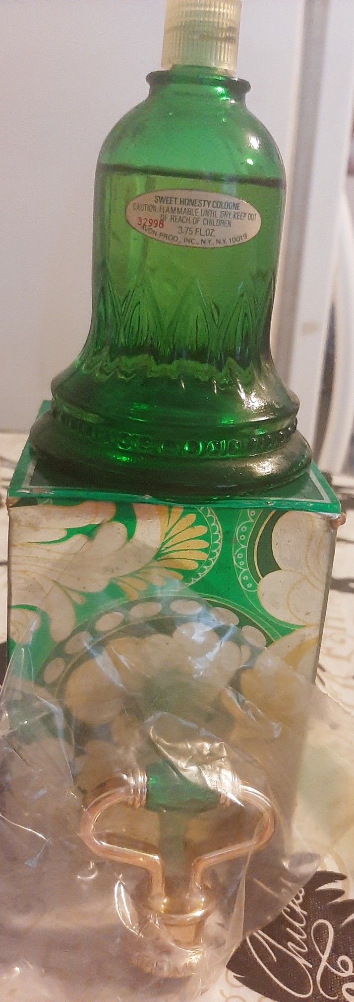 1977 VINTAGE AVON EMERALD BELL DECANTER W/SWEET HONESTY COLOGNE 3.75 FL OZ