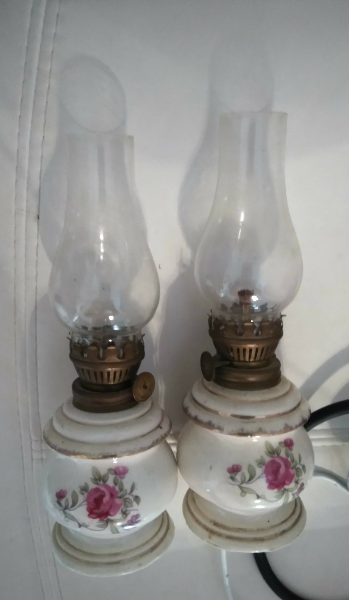 2 vintage hurricane lamps