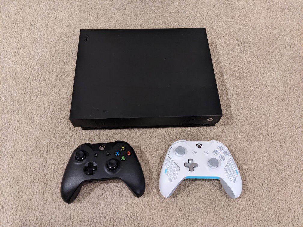 Xbox One X with extra controller and charging system