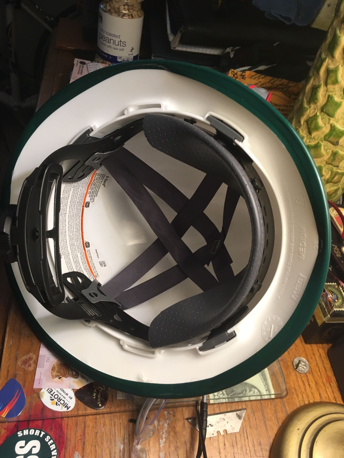 Safety helmet, reflective vest and safety glasses