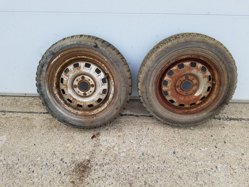 2 Plymouth Horizon studded snow tires and rims