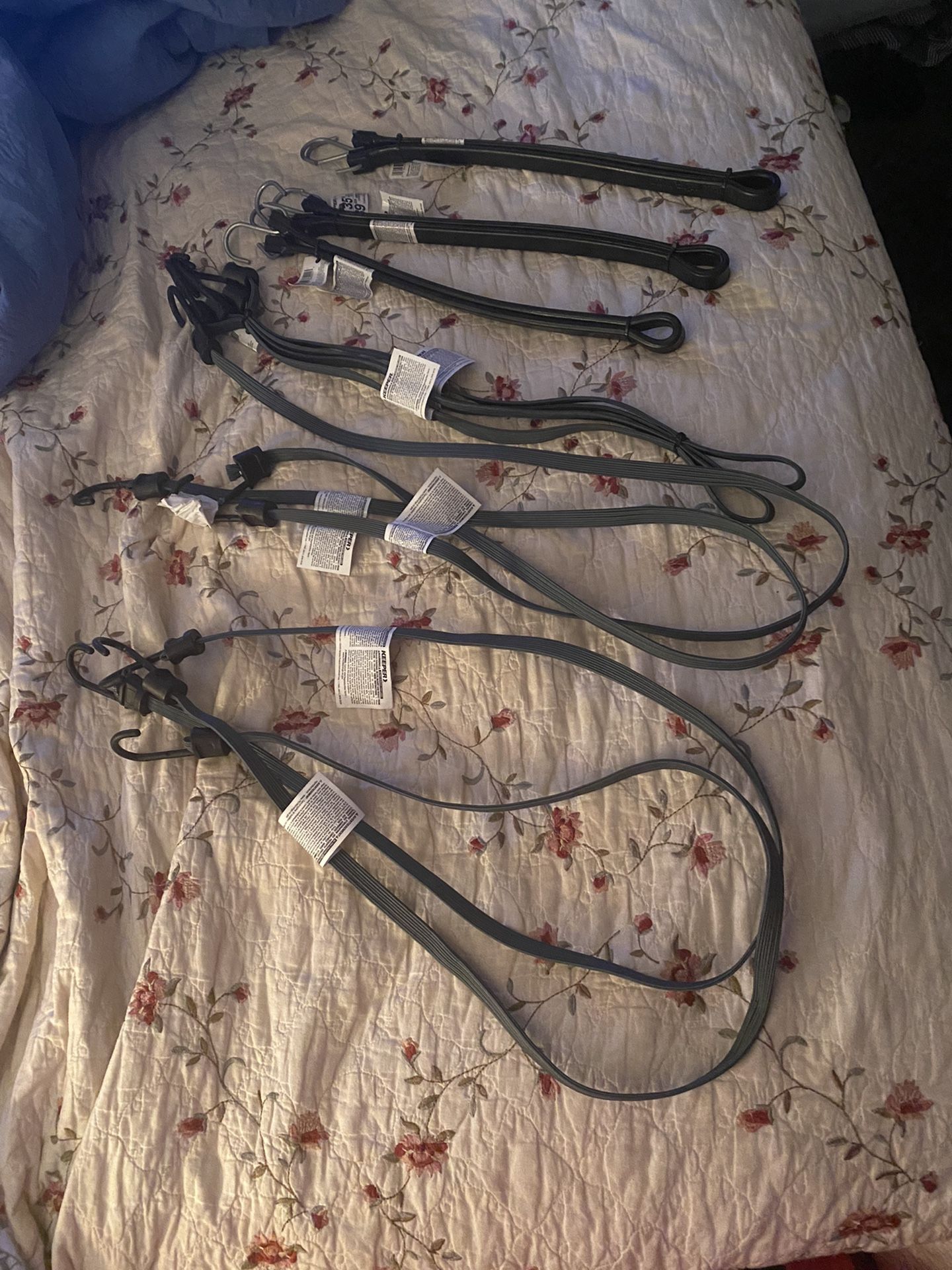 $30. (firm on price)-Nine long rubber/bungee straps. Brand new tags still on them. Paid $42 asking $30.