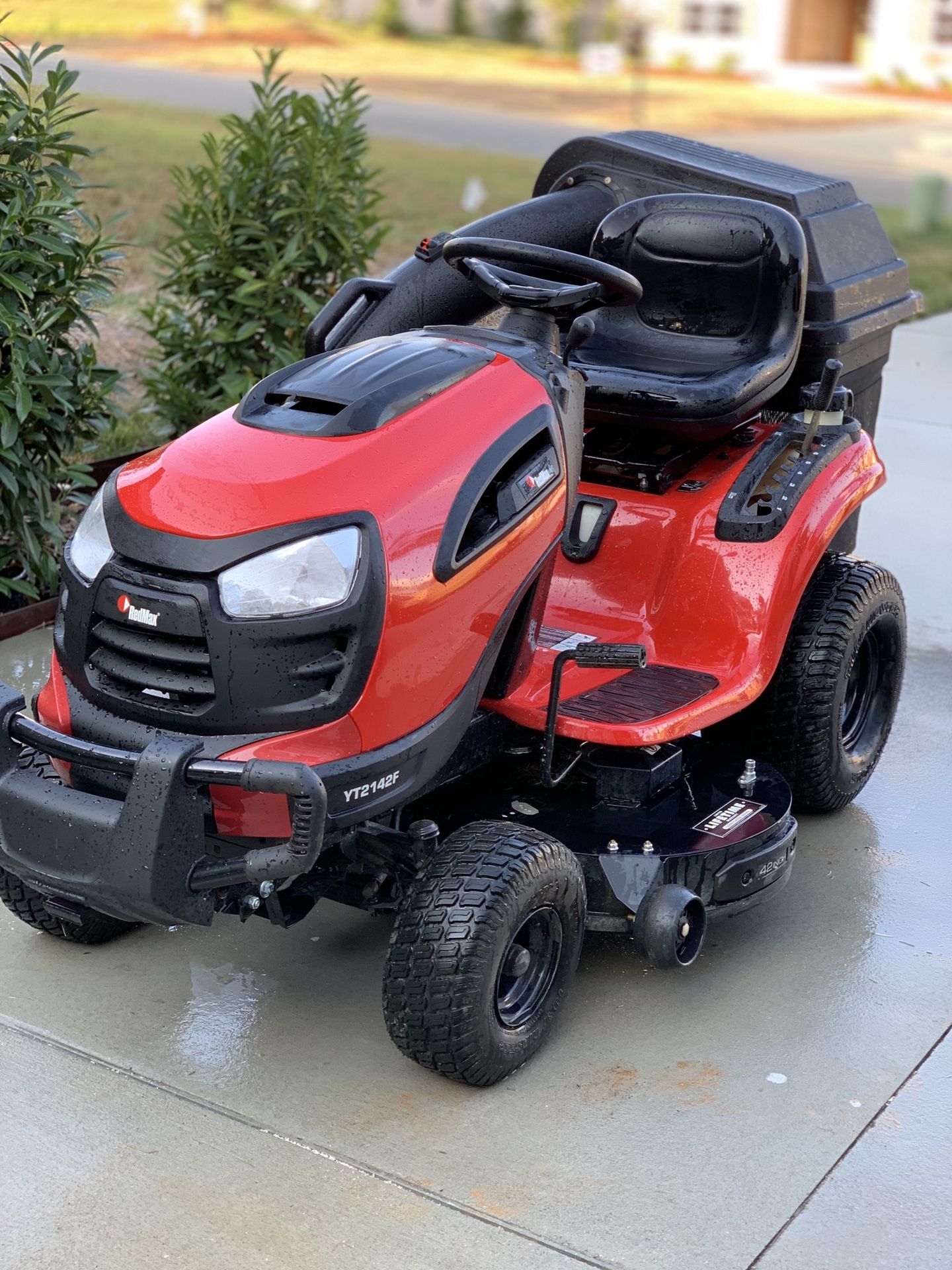 Almost brand new! Redmax riding lawn mower with 42 inch steel deck