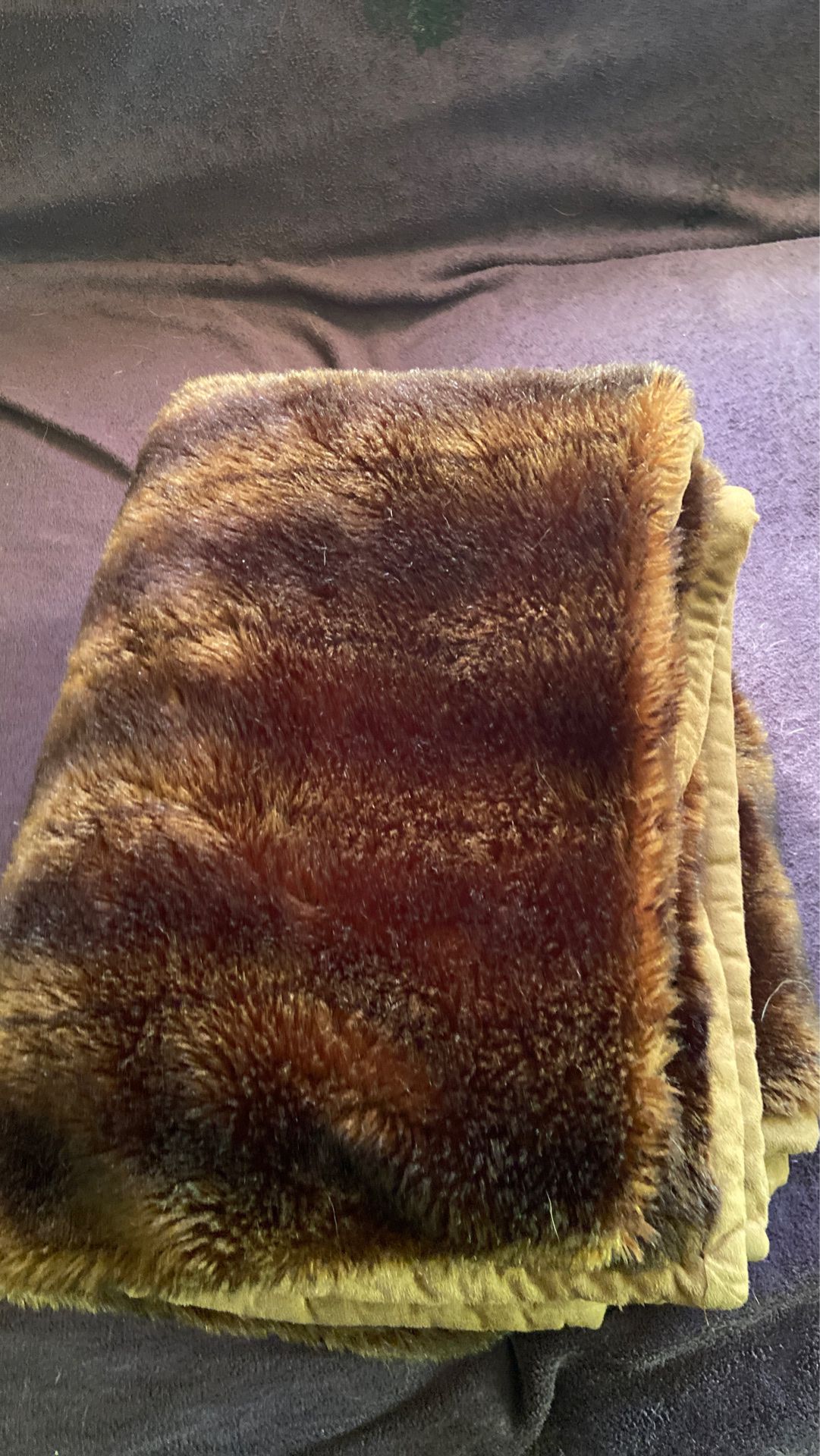 Soft synthetic brown fur blanket