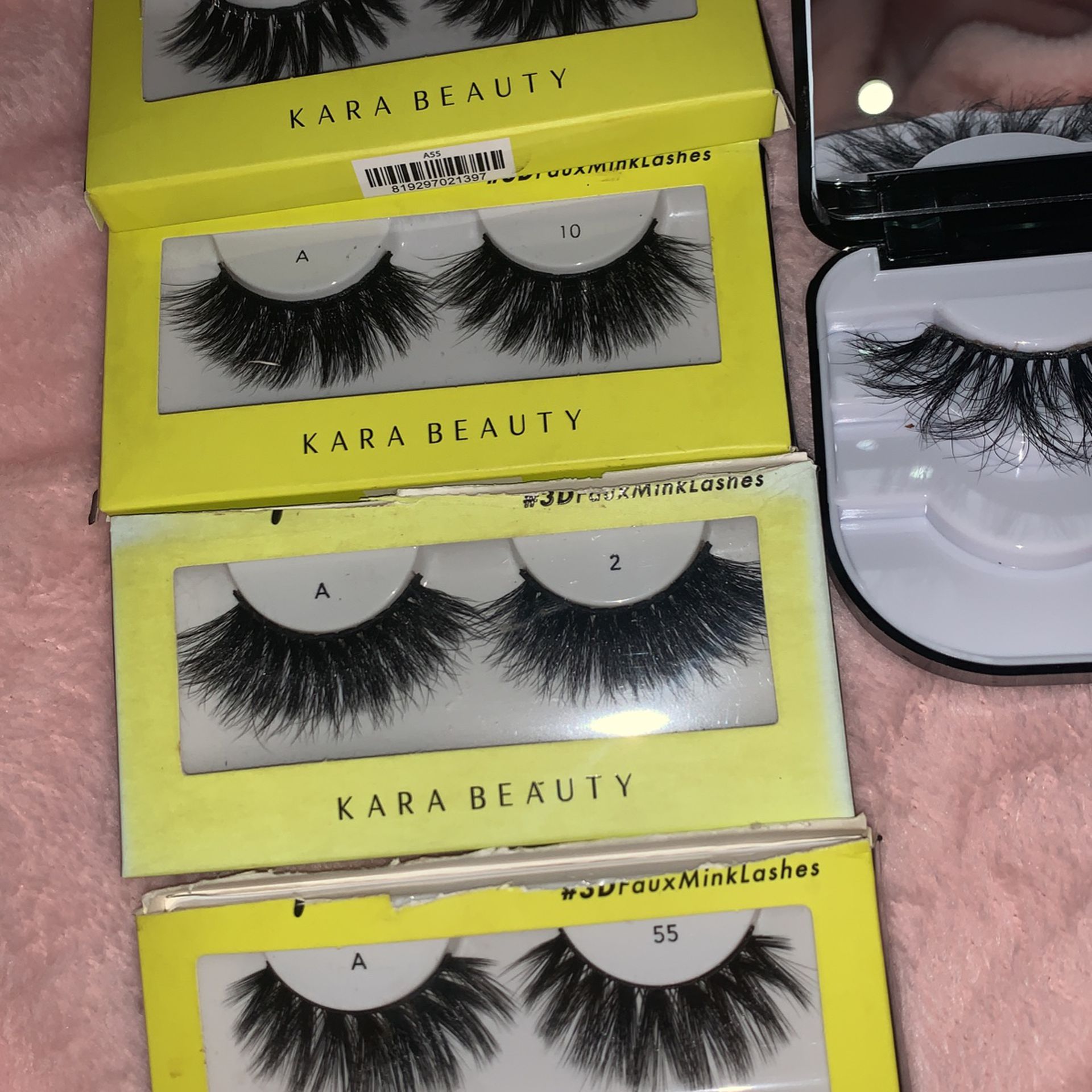 selling lashes . 1 pair for 5$ , 2 pairs for 10$ , 3 pairs for 20$ , 4 pairs for 39$ , Vanity eyelash keeper 20$ . All  for 70$ . Brand : Kara Beauty 