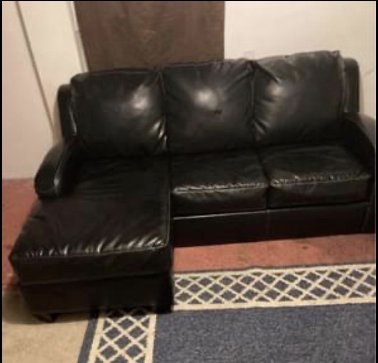 black leather sleeper ottoman sofa Folds Out To A Bed