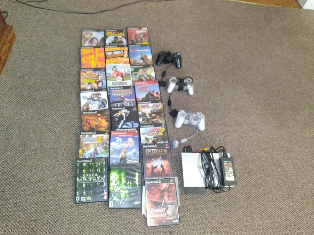 Ps2  With 24 Games & 3 Controls 