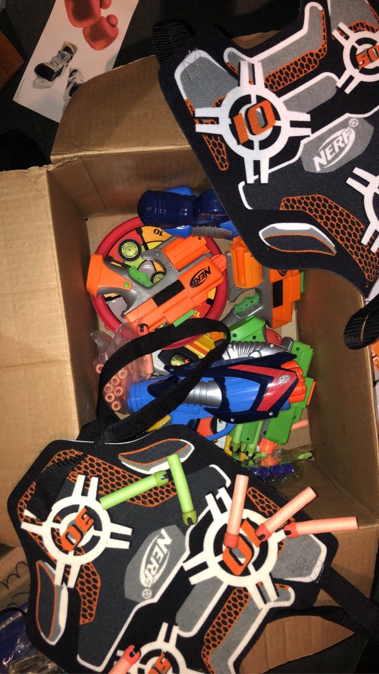 Box Of Nerf Guns Extra Darts And Target Vests