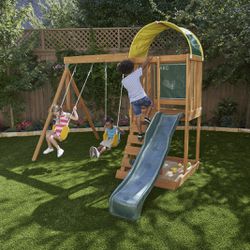KidKraft Ainsley Wooden Outdoor Swing Set with Slide, Chalk Wall, Canopy and Rock Wall Thumbnail