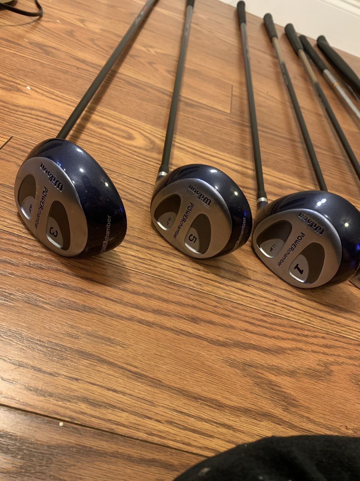 Vintage Wilson 19 golf clubs, bag, shoes, and golf balls.