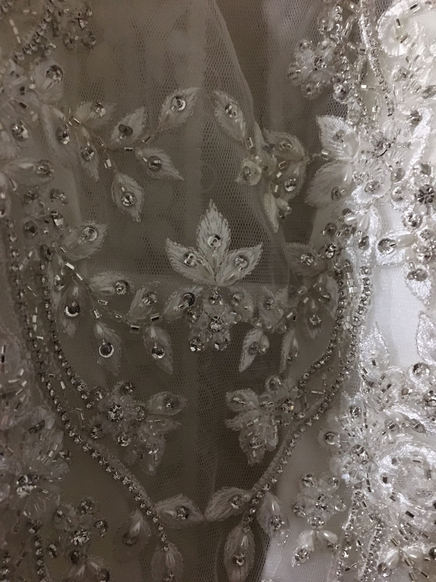 Size 8 Maggie sorrento wedding dress. Gold/ivory. Sweetheart neckline. Long train. Used in mint condition.