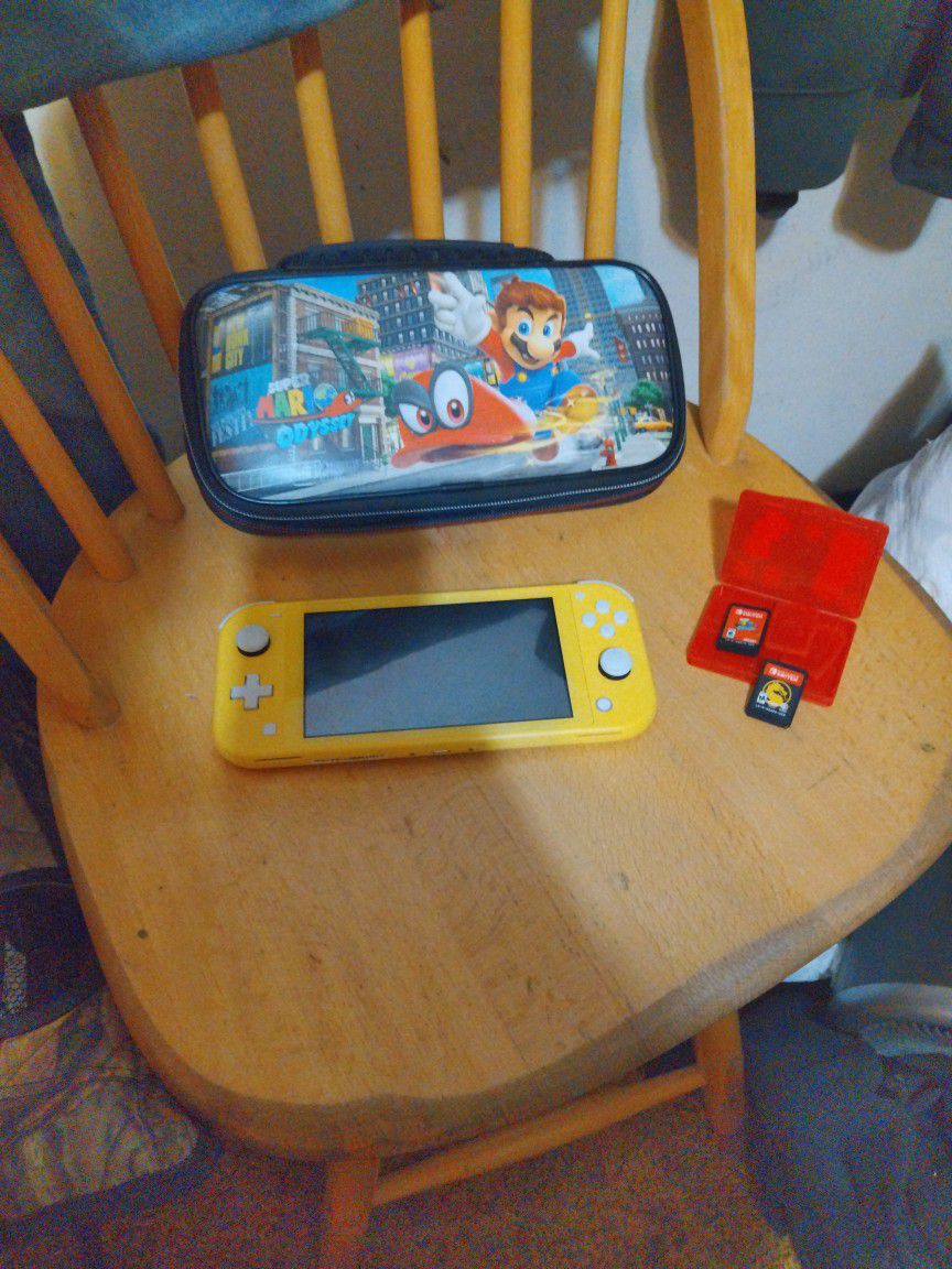 Yellow Nintendo Switch With Case  And Games