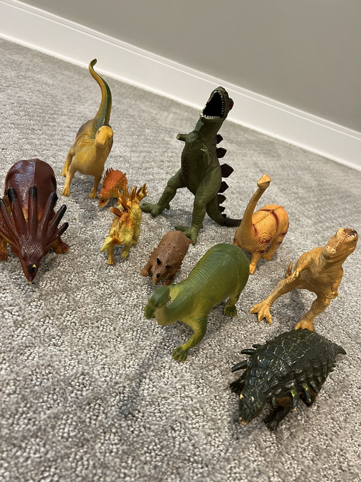 A lot of zoo animals and dinosaur Figurines