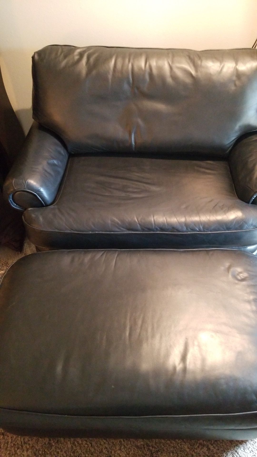Genuin black Leather oversized chair/love seat and ottoman