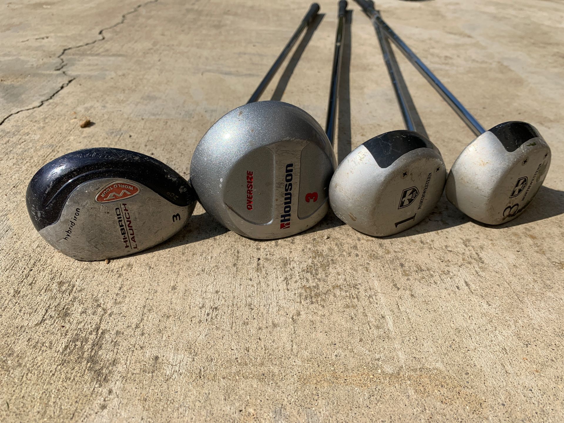 4 left handed golf clubs good condition