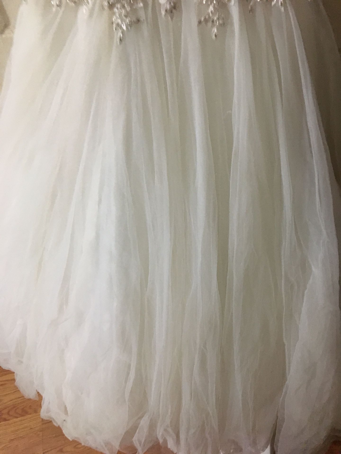 Size 8 Maggie sorrento wedding dress. Gold/ivory. Sweetheart neckline. Long train. Used in mint condition.
