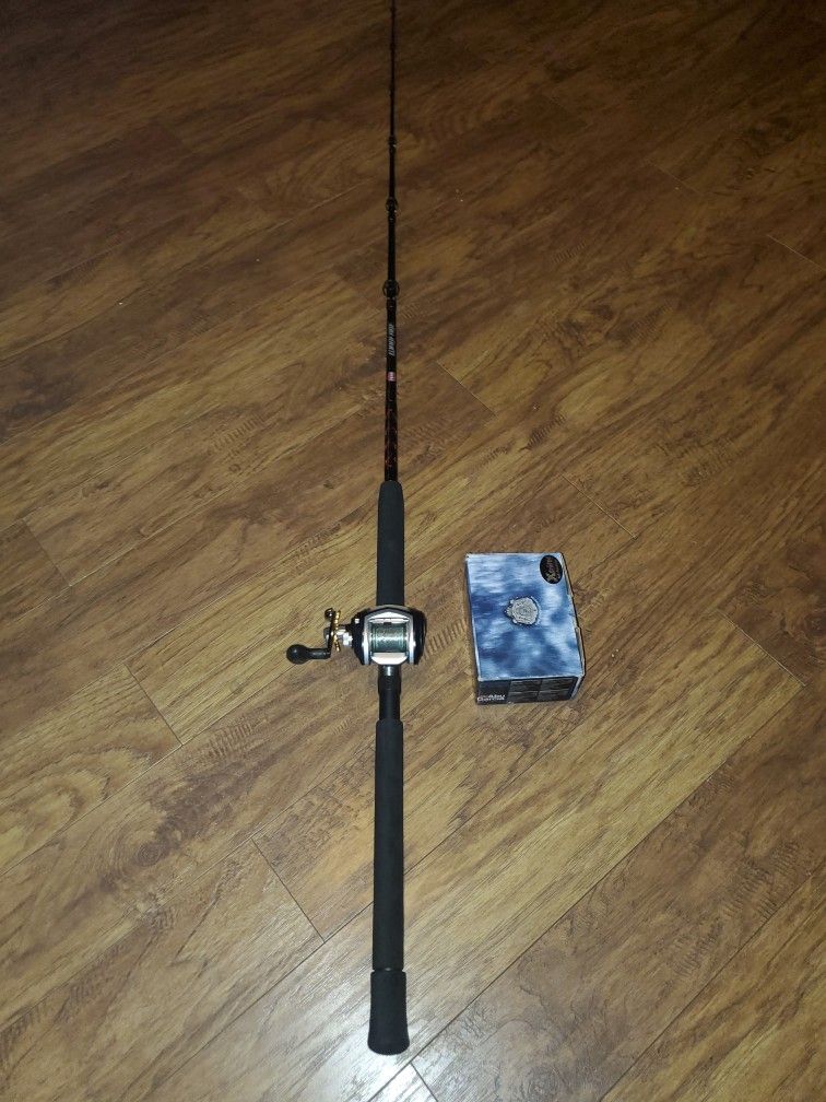 Abu Garcia revo toro61 winch with brand new penn warfare 6'6" heavy rod