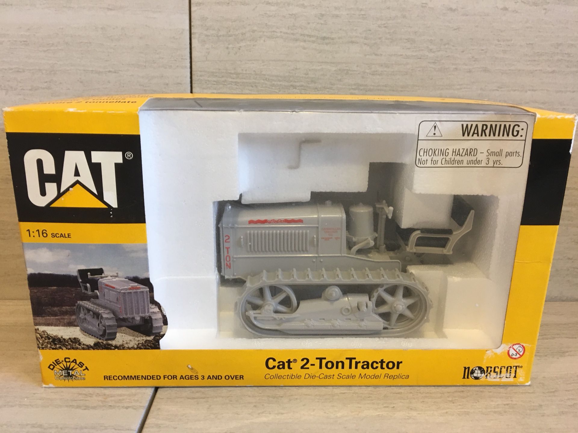 Norscot Die Cast 1:16 scale CAT 2-ton tractor- New in original packaging